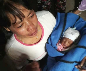 Giải cứu bé sơ sinh còn nguyên dây rốn bị bỏ dưới hầm nhà vệ sinh