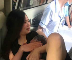 Anh chồng Sài Gòn sợ run đỡ đẻ cho vợ trên taxi