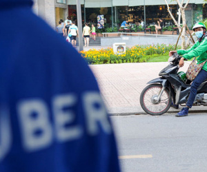 Ứng xử với Grab, Uber: Tiền lệ cho chính sách thời công nghệ 4.0