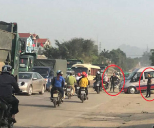 Nhóm thanh niên lạ mặt 'phân luồng' cho xe tải chở đất, gây ách tắc đường mòn Hồ Chí Minh
