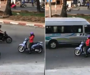 Người phụ nữ thản nhiên dừng xe nghe điện thoại giữa đường ngược chiều