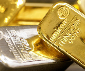 Giá vàng tăng vọt, vượt mốc 1.300 USD/ounce khi thượng đỉnh Mỹ-Triều bị hủy