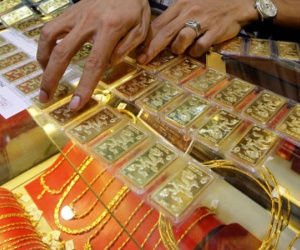 Giá vàng tăng nhẹ, USD ngân hàng vọt lên 22.870 đồng