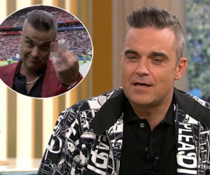 Robbie Williams giải thích hành động giơ 'ngón tay thối' trong lễ khai mạc World Cup