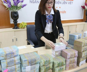 Lãi suất VND giảm sâu ép tỷ giá, Ngân hàng Nhà nước hối hả điều tiết