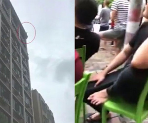Trung Quốc: Đám đông mang ghế nhựa ra ngồi xem thanh niên định nhảy lầu tự tử suốt 3 giờ