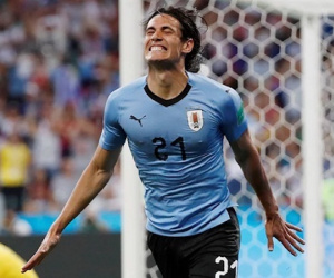 Cavani lập cú đúp, Uruguay loại Bồ Đào Nha