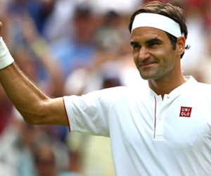 Federer thắng liền 35 điểm giao bóng, vào vòng ba Wimbledon