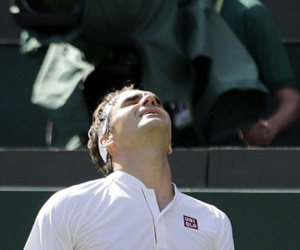 Bỏ lỡ điểm match, Federer dừng bước ở tứ kết Wimbledon