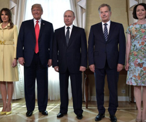 Melania mặc váy 3.700 USD tới cuộc gặp Trump - Putin