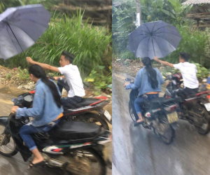 Liều mình che ô cho bạn gái ngày mưa, đã không được khen ga-lăng hay lãng mạn, chàng trai còn bị mắng té tát
