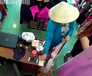 Clip: 'Nữ quái' đội nón lá, bịt mặt vào shop thời trang trộm tài sản