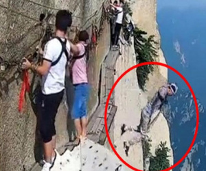 Đang đi trên vách núi nguy hiểm bậc nhất thế giới, người đàn ông đột nhiên tháo dây an toàn rồi nhảy xuống vực