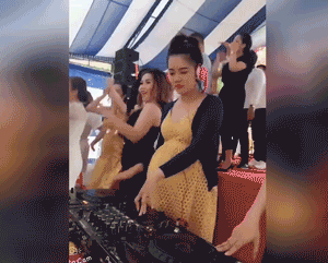 Clip bà bầu bụng to vượt mặt làm DJ quẩy tưng bừng trong đám cưới, người thích thú người lại lo cho em bé