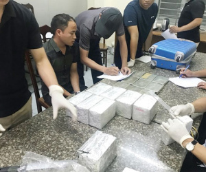Bất ngờ với 40 bánh heroin trong va li xách tay