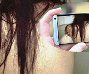 Dọa đưa 'ảnh nóng' cho chồng người tình để cưỡng đoạt tài sản