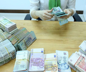 Việt Nam xuất siêu lớn, tỷ giá USD/VND hạ nhiệt nhanh