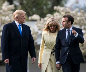 Vừa đáp xuống Paris, ông Trump đã mỉa mai tổng thống Pháp