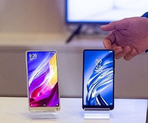 Nghèo mua iPhone, giàu mua điện thoại Xiaomi ở Trung Quốc