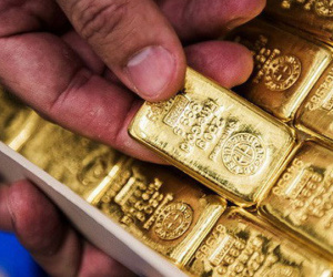Đồng USD tăng mạnh đẩy giá vàng giảm