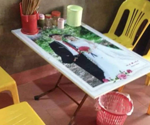 Vợ chồng chán nhau không nhất thiết phải quăng ảnh cưới ra bãi rác, đem ảnh đi 'thu hồi vốn' kiểu này còn sướng hơn