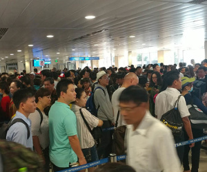 Tân Sơn Nhất khuyến cáo khách không bịt mặt đến sân bay dịp Tết