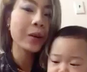 Tết của mẹ con 'hot girl Bella': Bé Peter tái xuất cực đáng yêu, ngoan ngoãn ngồi lòng mẹ chúc mừng năm mới