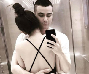 Vĩnh Thụy đăng ảnh ôm cô gái lạ giữa tin chia tay Hoàng Thùy Linh