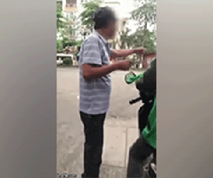 Người đàn ông tát thẳng mặt tài xế mặc áo Grab vì nghi tranh giành khách rồi chửi bới: 'Tao ngồi đây chơi à?'