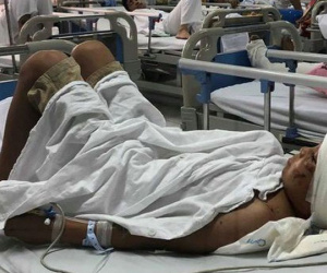 Máu trộn bùn ruộng khắp người em bé Thanh Hoá bị 2 con chó becgie cắn