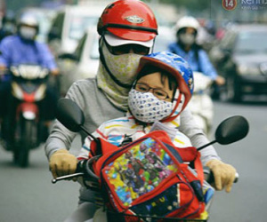 Ảnh: Sài Gòn lạnh như mùa đông Hà Nội, người dân co ro xuống phố