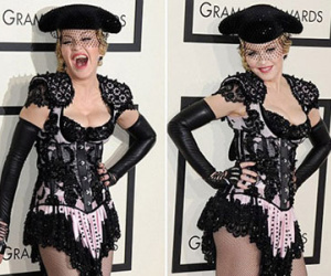 Madonna tốc váy khoe vòng ba trên thảm đỏ Grammy