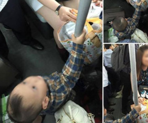 Hình ảnh cô gái xinh đẹp không nhường ghế xe bus cho em bé 2 tuổi bị lên án