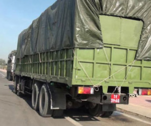 Kiểm tra xe biển đỏ chở quá tải, phát hiện biển số giả