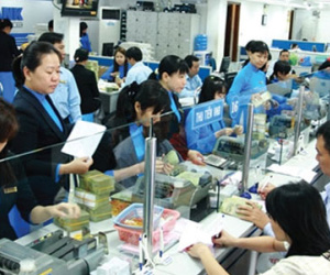 Dính vào Sacombank: Eximbank tuột dốc?