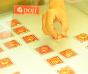 Lãi suất đôla Mỹ tăng chậm, giá vàng lên đỉnh 2 tuần
