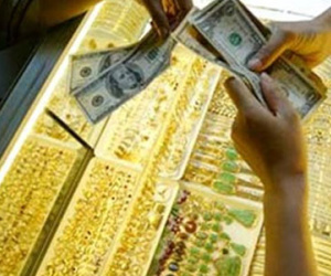 Vàng và dầu tăng nhẹ, USD ổn định phiên đầu tuần