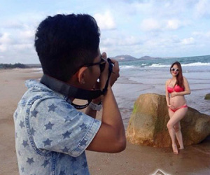 Khánh Thi diện bikini khoe bụng bầu làm mẫu ảnh cho Phan Hiển