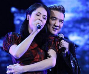 Thu Phương tháo giày để xứng đôi với Đàm Vĩnh Hưng