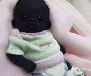 Sự thật ngỡ ngàng về "Em bé châu Phi đen nhất thế giới"