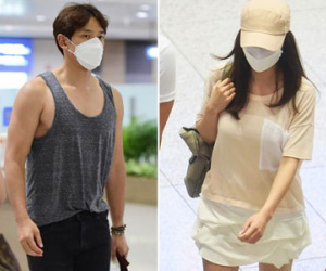 Bắt gặp Bi Rain và Kim Tae Hee tại sân bay