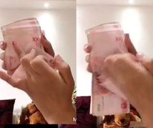 Clip: Xuất hiện "thánh" đếm tiền nhanh hơn cả máy