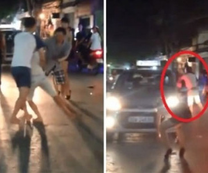 Clip: Người đàn ông giật tóc, đánh vợ dã man gây tắc nghẽn đường phố