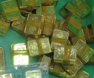 Giá vàng rớt khỏi mốc 34 triệu đồng/lượng