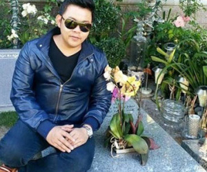 Quang Lê giải thích vụ ngồi trên mộ nhạc sĩ ở Mỹ