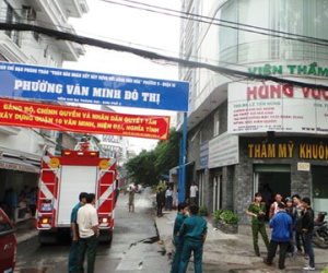 Ném đá lên thẩm mỹ viện cao 8 tầng để báo cháy