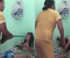 Clip mẹ dùng chổi quật liên tiếp vào người con nhỏ gây tranh cãi