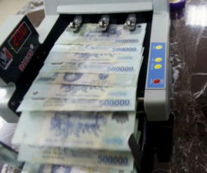 IMF “hoan nghênh” việc Việt Nam điều chỉnh tỷ giá tiền đồng