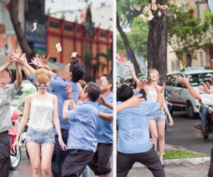 Cô gái mặc gợi cảm tung tiền "giải đen" trên phố Sài Gòn