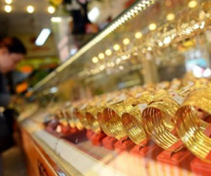 Vàng và USD cùng giảm mạnh